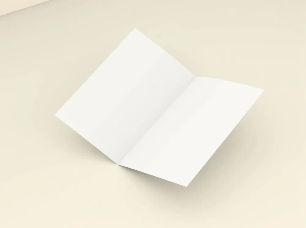 A folded single-card funeral program on a cream background